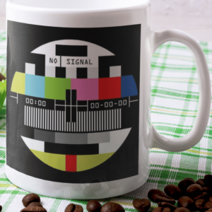 Retro coffee mug featuring multicolor TV test pattern and “No Signal” text, 11 oz ceramic vintage-style mug