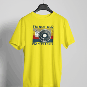 Yellow t-shirt with retro vinyl record player and the phrase 'I’m Not Old, I’m a Classic' in bold lettering